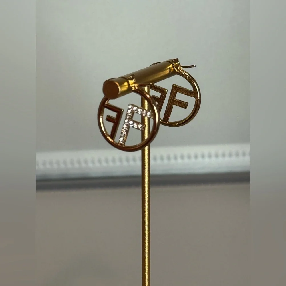 New Arrivals! Fashion Gold and Rhinestone Logo Hoop Earrings.